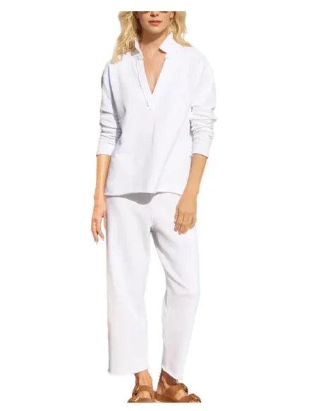 White long-sleeve V-neck top and matching cropped pants for comfortable everyday wear
