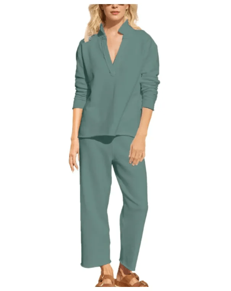 Women's teal lounge set with long-sleeve top and cropped pants, stylish comfort wear