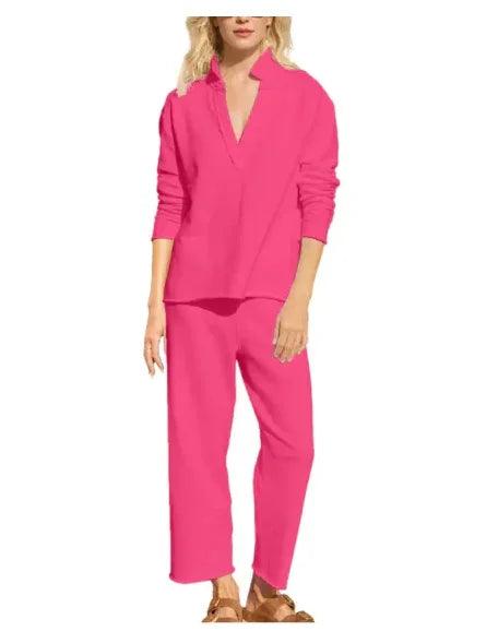 Bright pink women's lounge set with long sleeves and relaxed fit pants, ideal for comfortable everyday wear