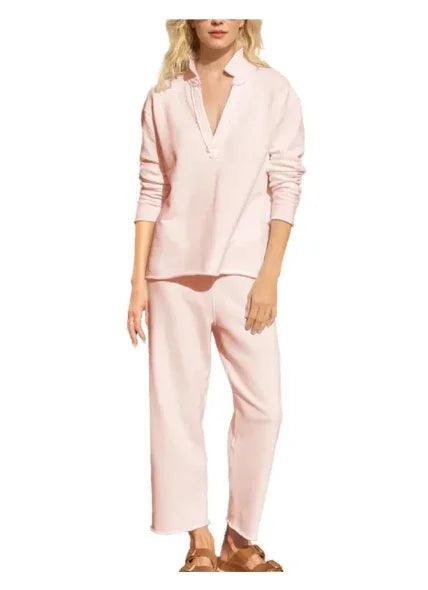 Pink women's lounge set with long sleeves and relaxed fit pants, ideal for comfortable everyday wear